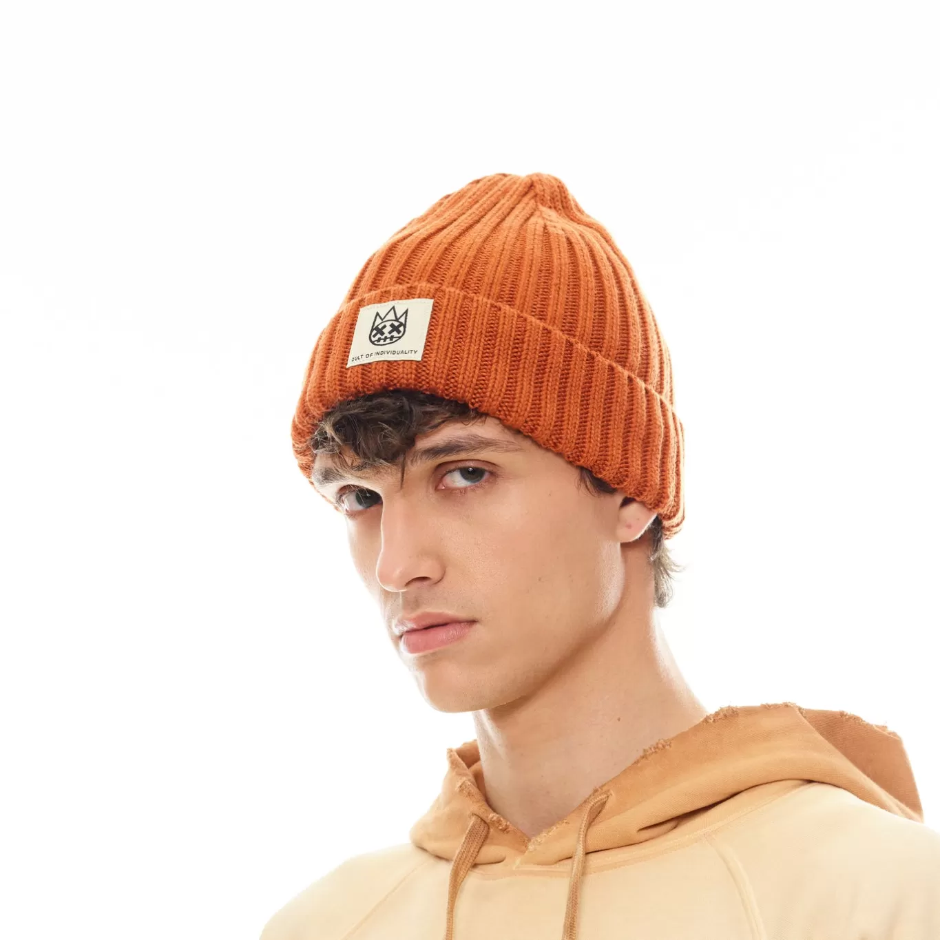 Cult Of Individuality Knit Hats<SHIMUCHAN LOGO KNIT HAT IN VINTAGE RUST ORANGE